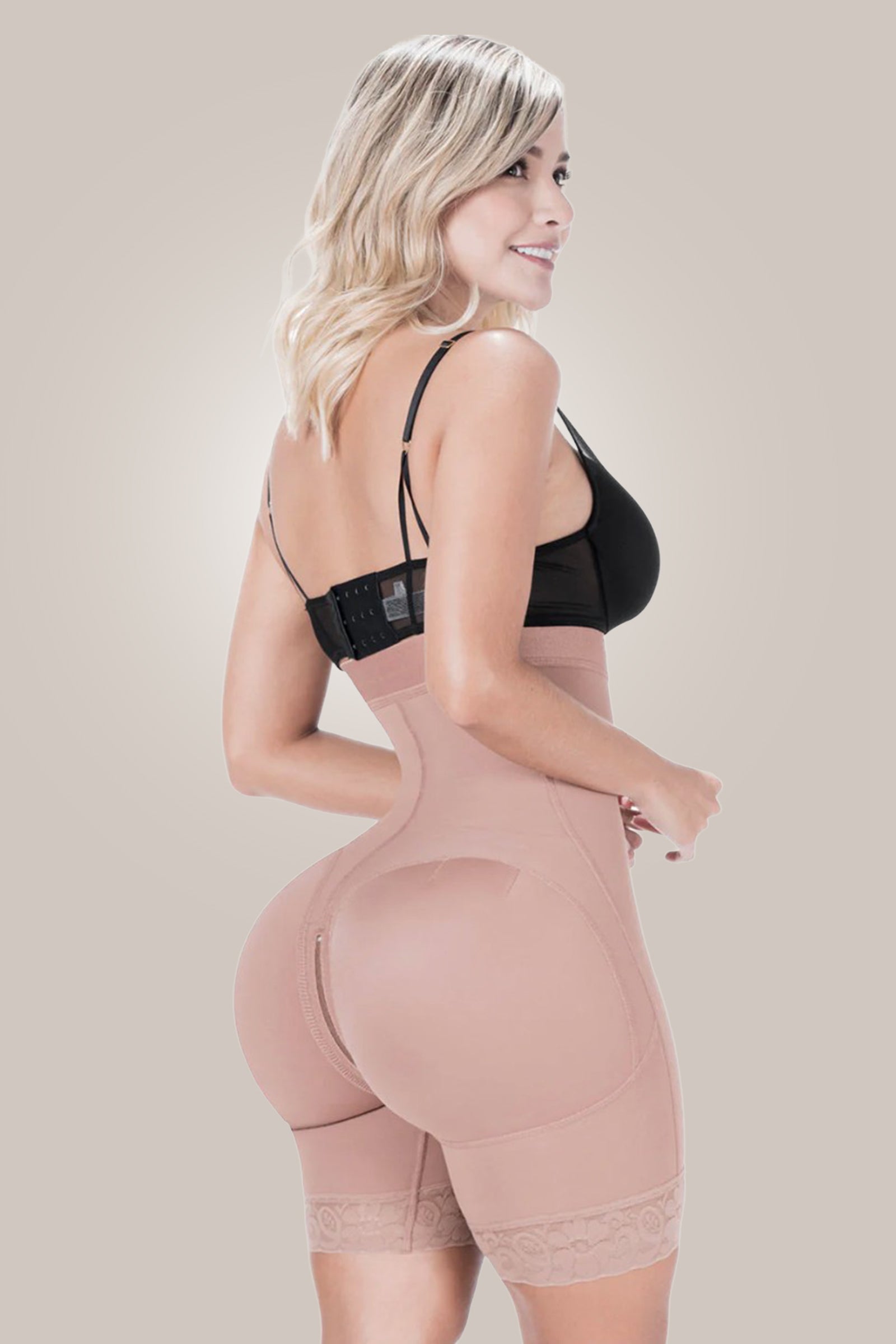 Woman wearing shapewear shorts tummy control - twist