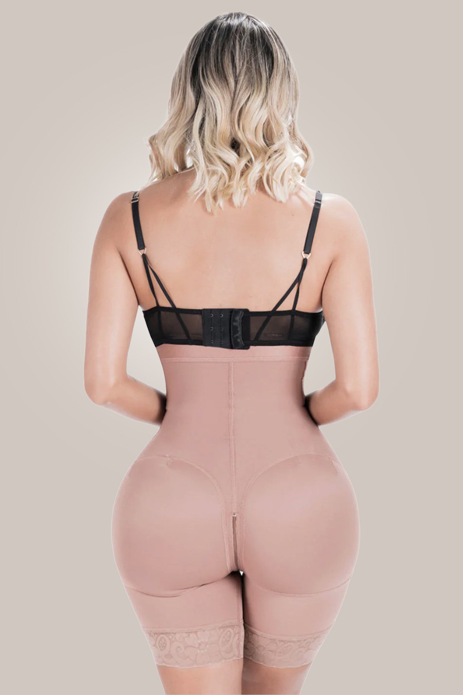 Woman wearing a waist trainer with butt lift - back